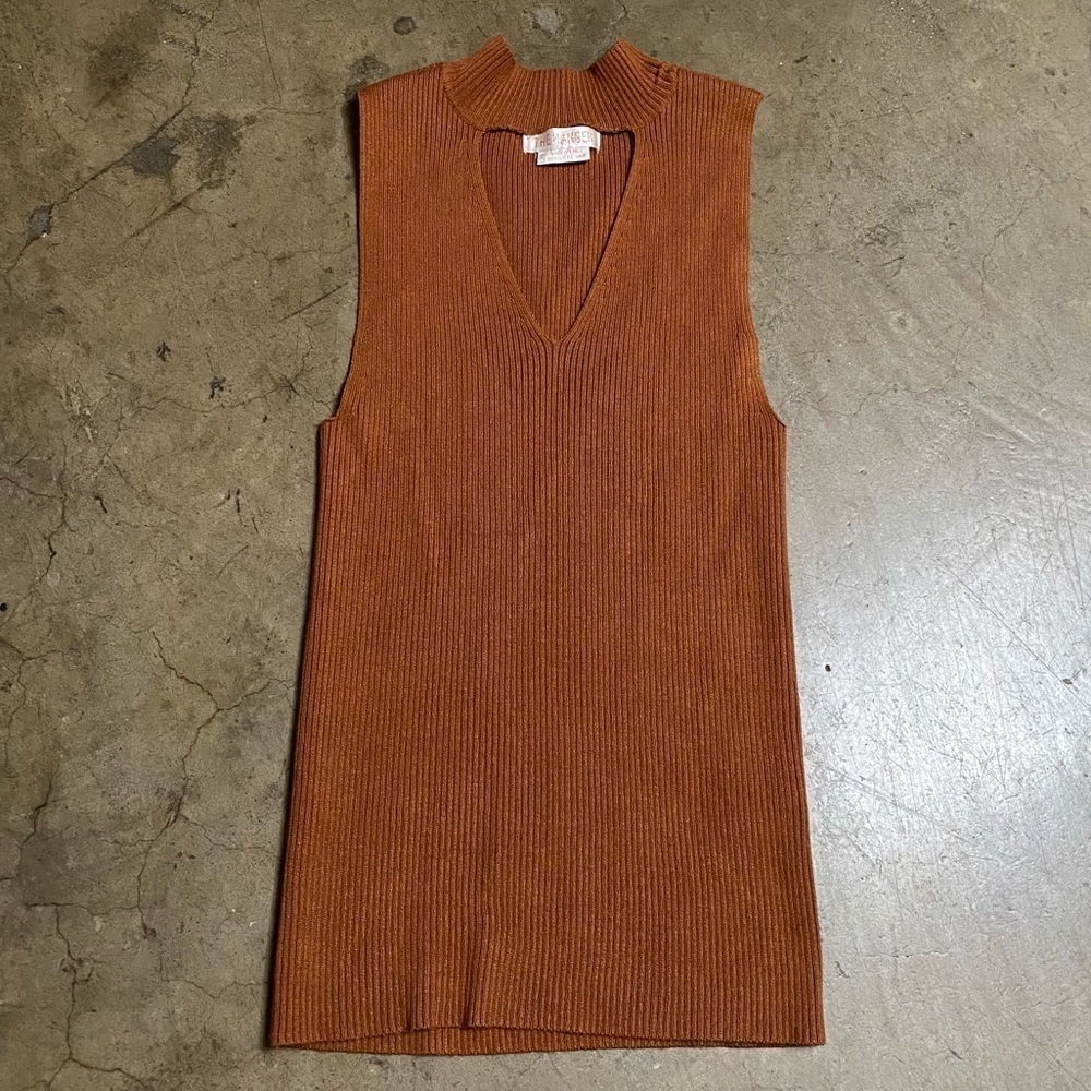 Sleeveless open front top